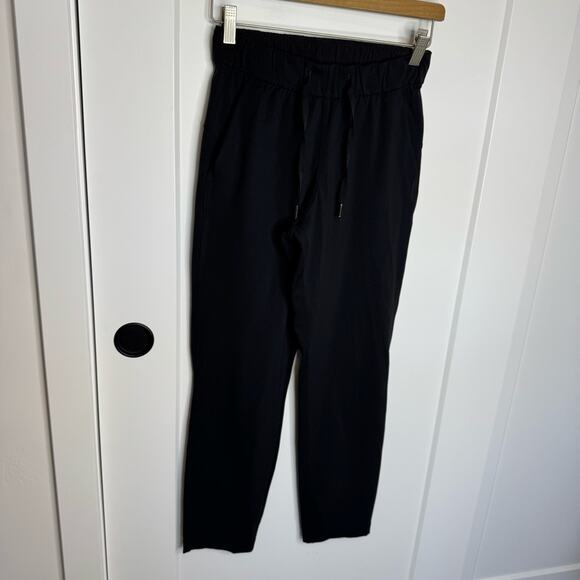 Lululemon On the Fly 7/8 Pant Drawstring Active Black Full On Luxtreme Size 2 - Picture 2 of 6